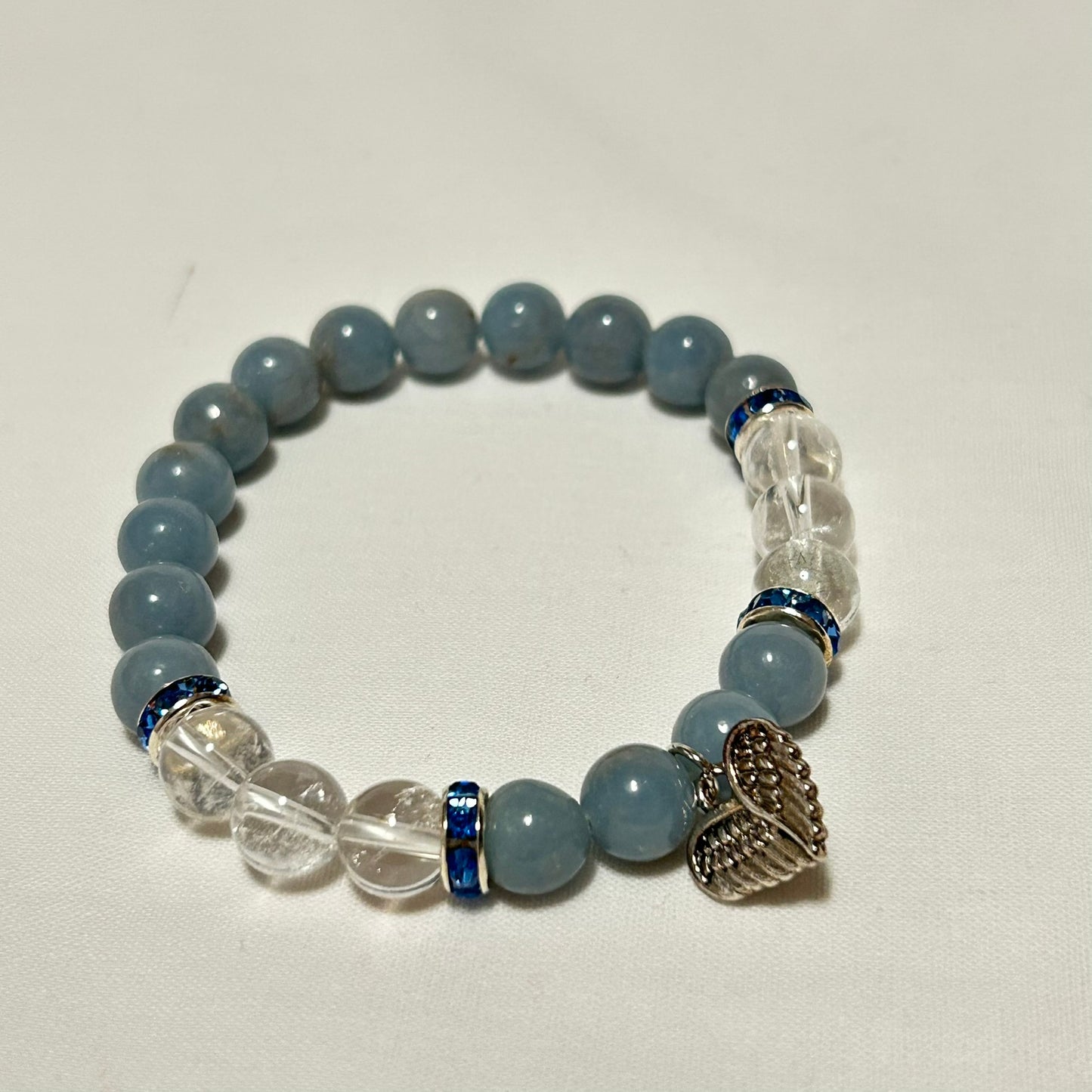 Armband Angelit, bergkristall med änglavingar 8 mm