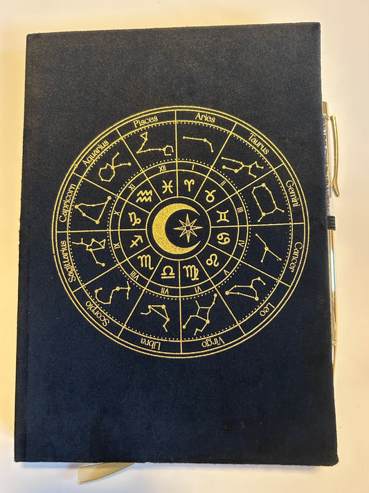 Skrivbok astrologihjul med penna